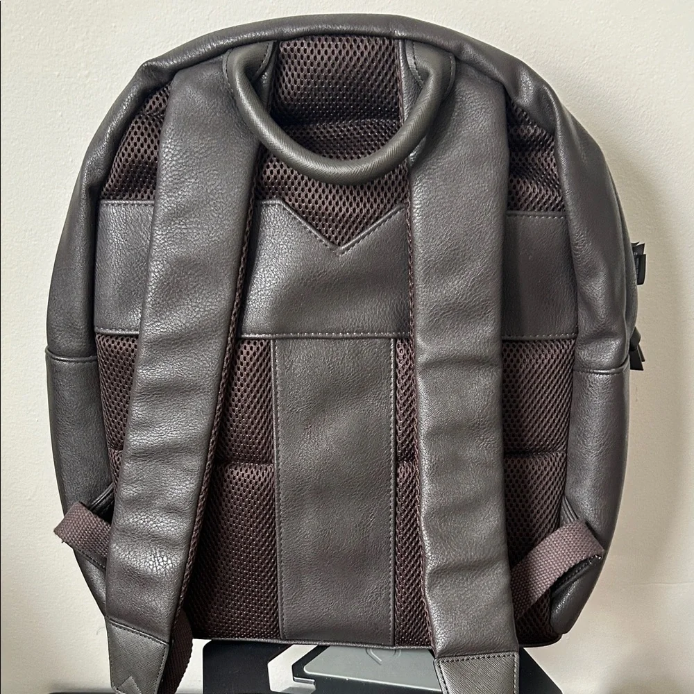 Ted Baker faux leather backpack in dark brown with bold stripe detail!